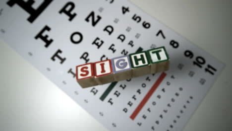 Blocks-spelling-sight-falling-on-eye-test