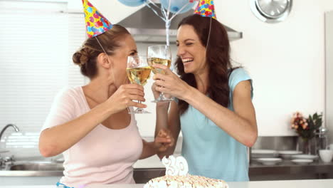 Woman-blowing-candle-and-celebrating-her-birthday-