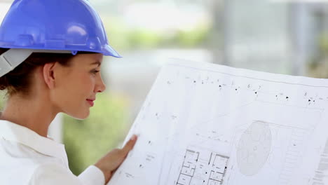 Female-architect-smiling-to-the-camera