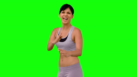 Sportliche-Frau-Macht-Kampfsport-Pose-Auf-Greenscreen