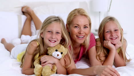Mother-and-her-daughters-smiling