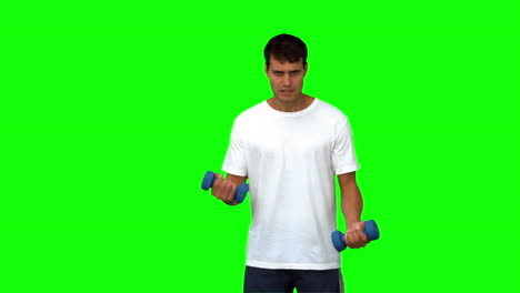 Handsome-man-lifting-dumbbells-on-green-screen