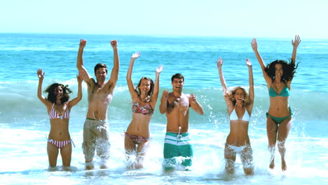 Happy-friends-jumping-in-the-water