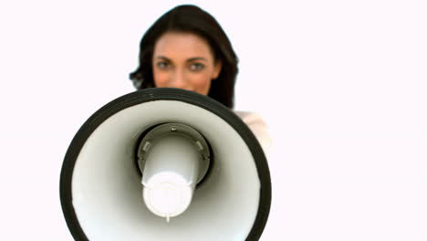 Businesswoman-showing-megaphone-to-the-camera