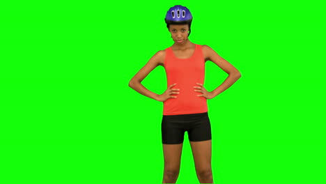 Cyclist-woman-standing-on-green-screen