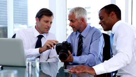 Businessmen-looking-at-camera-