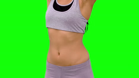 Mujer-Atlética-Estirando-La-Parte-Superior-De-Su-Cuerpo-En-Pantalla-Verde