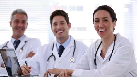 Team-of-doctors-laughing-together
