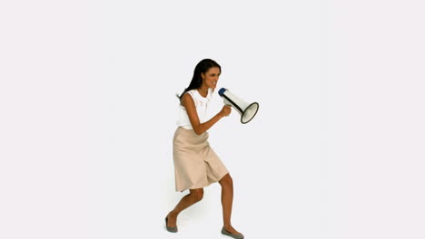Angry-businesswoman-shouting-on-megaphone