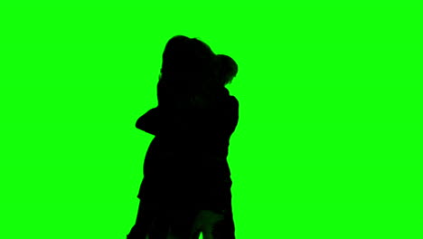 Silhouetten-Eines-Paares,-Das-Sich-Wieder-Trifft,-Auf-Einem-Greenscreen