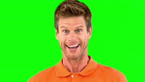 Handsome-man-saying-yes-with-his-head-on-green-screen