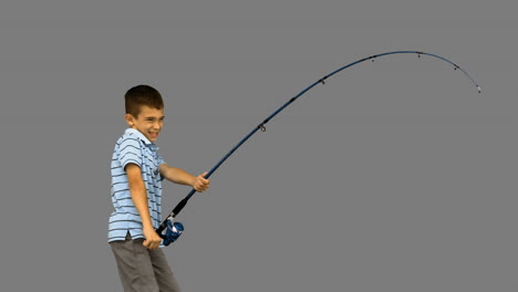 Little-boy-fishing-on-grey-screen