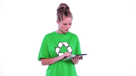 Lovely-environmental-activist-using-thoughtful-her-tablet