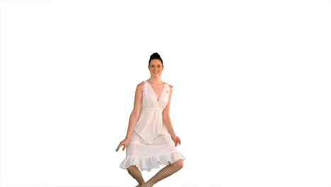 Beautiful-model-in-white-dress-jumping