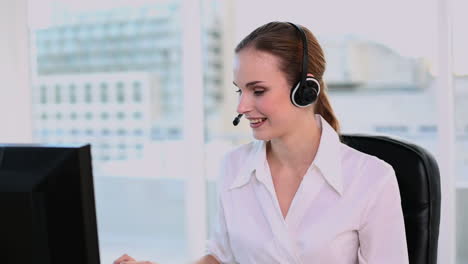 Happy-call-center-agent-working-