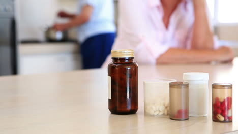 Worried-senior-woman-looking-at-her-tablets