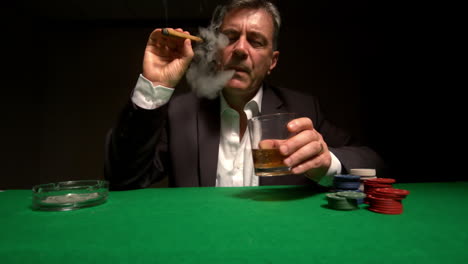 Cool-gambler-smoking-a-cigar