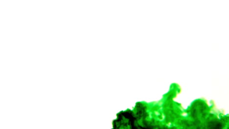 Green-ink-pouring-into-water-on-white-background