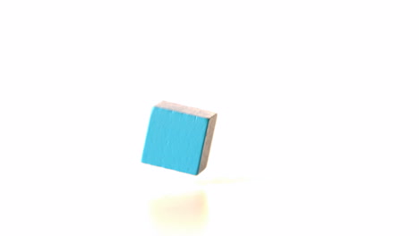Blue-building-block-falling-and-bouncing
