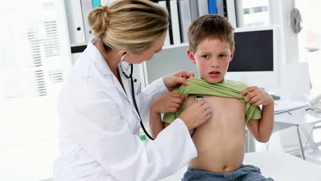 Doctor-listening-to-little-boys-breathing