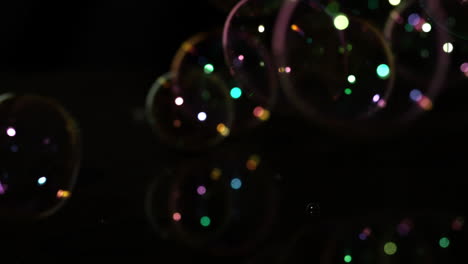 Bubbles-floating-on-black-background