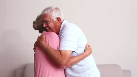 Senior-couple-hugging