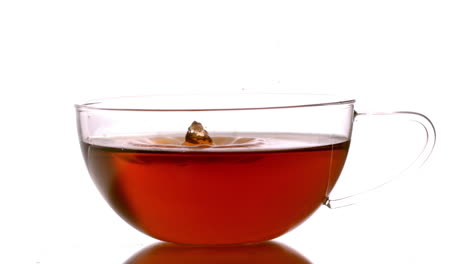 Drop-falling-into-a-clear-cup-of-tea