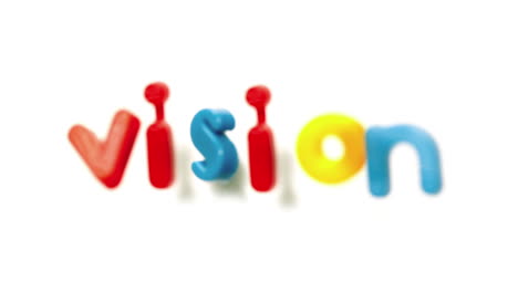 Vision-spelled-out-in-alphabet-magnet-letters