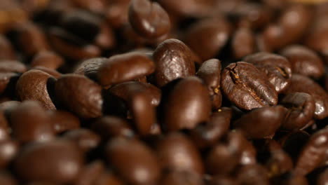 Coffee-beans-pouring-onto-more-beans