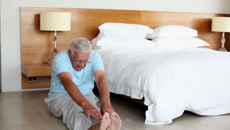 Senior-man-doing-exercises-in-the-morning