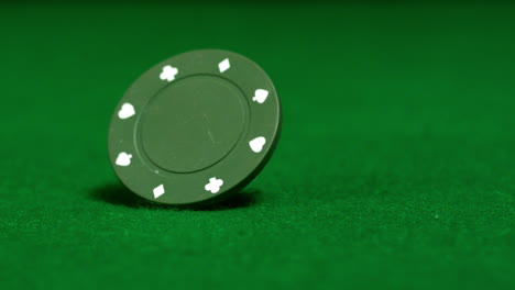 Green-chip-spinning-on-casino-table
