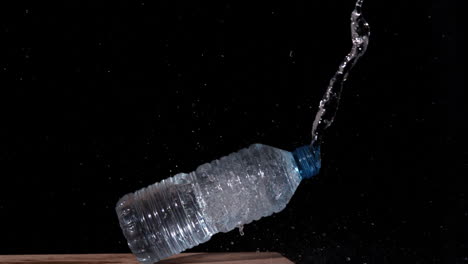 Arrow-shooting-through-plastic-bottle