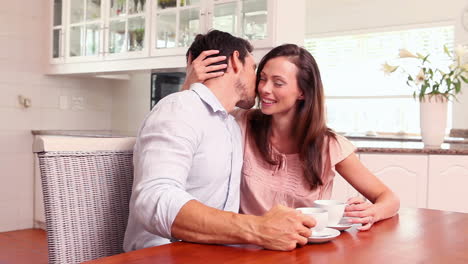 Happy-couple-drinking-coffee-together