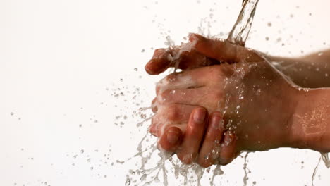 Woman-washing-her-hands-with-soap