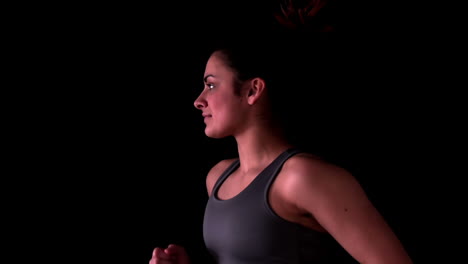 Woman-jogging-in-black-top