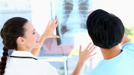 Doctor-and-nurse-discussing-xray