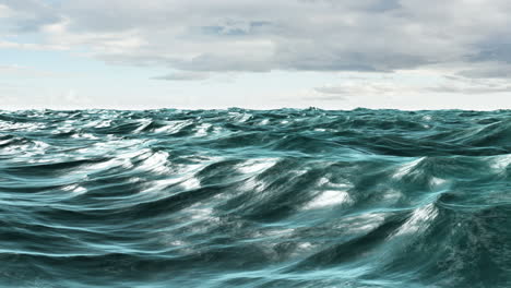 Choppy-blue-ocean-under-cloudy-sky-