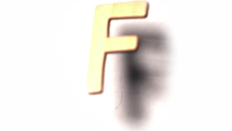 The-letter-f-rising-on-white-background