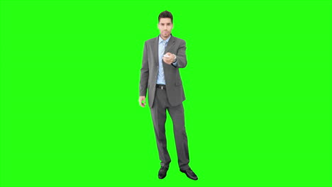 Young-businessman-using-remote-control