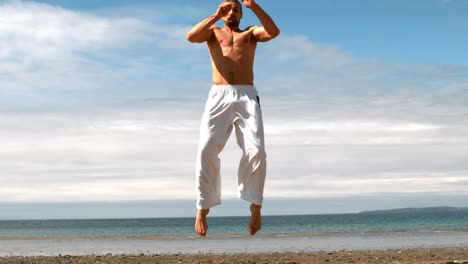 Martial-arts-expert-practicing-by-the-coast