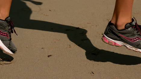 Woman-jogging-on-the-sand