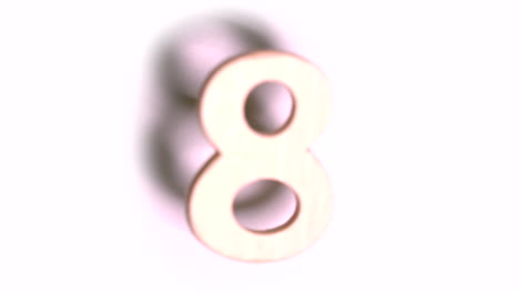 Die-Zahl-8-Steigt-Auf-Weißem-Hintergrund