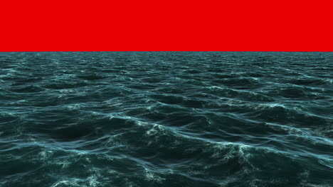 Choppy-blue-ocean-under-red-screen-sky-