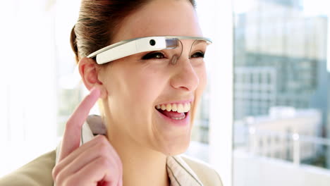 Pretty-businesswoman-using-smart-glasses