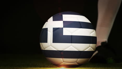 Football-player-kicking-greece-flag-ball