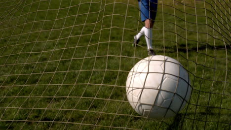 Football-hitting-the-back-of-the-net