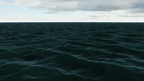 Choppy-blue-ocean-under-cloudy-sky-