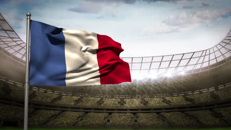 France-national-flag-waving-on-stadium-arena