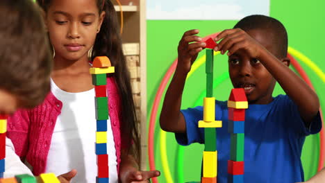 Cute-classmates-playing-with-building-blocks