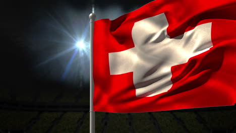 Swiss-national-flag-waving-on-flagpole